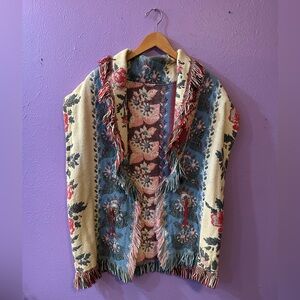 SOLDVintage Colorful Floral Blanket Vest with Fringe and Metal Decorative Detail